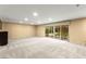 Expansive basement with sliding glass doors leading to the outside at 226 Dalmatian Ln, Las Vegas, NV 89107