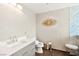 Renovated bathroom featuring a modern vanity with stylish fixtures and unique wall decorations at 226 Dalmatian Ln, Las Vegas, NV 89107