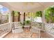 Charming gazebo with comfortable seating and a serene view of the lush greenery in the backyard at 226 Dalmatian Ln, Las Vegas, NV 89107