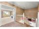 Hallway with a staircase, doorways, and a view into the living room at 226 Dalmatian Ln, Las Vegas, NV 89107