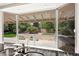Kitchen window view of the outdoor entertaining area, complete with built in BBQ and patio at 226 Dalmatian Ln, Las Vegas, NV 89107