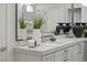 Bathroom vanity features dual sinks, modern fixtures, and decorative accents at 2508 Faiss Dr, Las Vegas, NV 89134