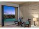 Relaxing bedroom featuring an open view of the pool and city skyline at 2508 Faiss Dr, Las Vegas, NV 89134