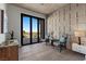 Relaxing bedroom sitting area with views of the pool and mountain landscape at 2508 Faiss Dr, Las Vegas, NV 89134