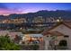 Backyard patio area with a beautiful view of the city skyline and mountains at 2508 Faiss Dr, Las Vegas, NV 89134