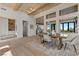 Open dining area featuring wood floors, modern decor, and a clear view of the kitchen at 2508 Faiss Dr, Las Vegas, NV 89134