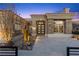 Desert landscaping and stone accents enhance the curb appeal of this home at 2508 Faiss Dr, Las Vegas, NV 89134