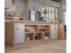 Beautiful kitchen island with wood accents and concrete countertops and ample storage space at 2508 Faiss Dr, Las Vegas, NV 89134