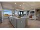 Bright open-concept living space featuring kitchen and outdoor patio access at 2508 Faiss Dr, Las Vegas, NV 89134