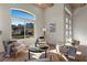 Cozy living space with large windows offering scenic mountain views and natural light at 2508 Faiss Dr, Las Vegas, NV 89134