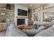 This modern living room features a cozy fireplace and built-in shelving at 2508 Faiss Dr, Las Vegas, NV 89134