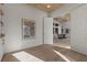 Bright office space features a modern design, light wood floors, artistic decor, and an open doorway to another room at 2508 Faiss Dr, Las Vegas, NV 89134