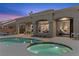 Stunning backyard pool and spa with views into the open-concept living space at 2508 Faiss Dr, Las Vegas, NV 89134