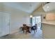 Dining area with adjacent kitchen, and sliding door access to the outdoor patio at 2925 Wigwam Pkwy # 1124, Henderson, NV 89074