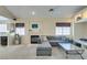 Comfortable living room with fireplace, vaulted ceilings, and ample natural light at 2925 Wigwam Pkwy # 1124, Henderson, NV 89074