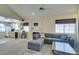 Bright living room with fireplace, vaulted ceiling, and an open layout at 2925 Wigwam Pkwy # 1124, Henderson, NV 89074