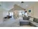 Expansive open-concept layout with dining area, fireplace, and vaulted ceilings at 2925 Wigwam Pkwy # 1124, Henderson, NV 89074