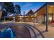 Backyard oasis showcasing a pool with a cascading spa and an expansive patio perfect for outdoor living at 2961 Augusta Dr, Las Vegas, NV 89109