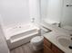 Bathroom featuring a combined tub and shower, along with a vanity and toilet at 2986 Juniper Hills Blvd # 202, Las Vegas, NV 89142