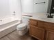Cozy bathroom featuring a combined tub and shower, along with a vanity and toilet at 2986 Juniper Hills Blvd # 202, Las Vegas, NV 89142