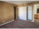 Bedroom featuring a large sliding closet door and access to an ensuite bathroom at 2986 Juniper Hills Blvd # 202, Las Vegas, NV 89142