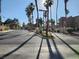 Gated entrance to a community lined with palm trees, providing security and curb appeal at 2986 Juniper Hills Blvd # 202, Las Vegas, NV 89142