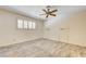 Bedroom with hardwood floors, shuttered windows, and ceiling fan at 3063 Chapala Dr, Las Vegas, NV 89120