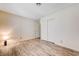 Bedroom features wood-look floors, closet, and a light fixture at 3063 Chapala Dr, Las Vegas, NV 89120