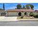 Charming single-story home featuring stucco siding, desert landscaping and an attached two-car garage at 3063 Chapala Dr, Las Vegas, NV 89120