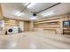Bright and spacious garage with built-in shelving units for organized storage solutions at 3063 Chapala Dr, Las Vegas, NV 89120