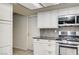 Modern kitchen with stainless steel appliances and granite countertops at 3063 Chapala Dr, Las Vegas, NV 89120