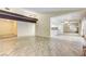 Spacious living room with tile and hardwood floors and an open floor plan at 3063 Chapala Dr, Las Vegas, NV 89120