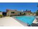 Sparkling backyard pool with a covered patio, perfect for swimming and recreation at 3063 Chapala Dr, Las Vegas, NV 89120
