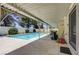 Inviting outdoor pool with covered patio, ideal for relaxation and entertaining at 3063 Chapala Dr, Las Vegas, NV 89120