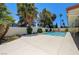 Backyard pool with lush landscaping, offering a private oasis for outdoor enjoyment at 3063 Chapala Dr, Las Vegas, NV 89120