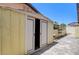 Outdoor shed with double doors provides extra storage space and organizational capabilities for your convenience at 3063 Chapala Dr, Las Vegas, NV 89120