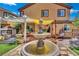 Spacious backyard features a tranquil water fountain at 326 Caneflower Ct, North Las Vegas, NV 89031