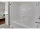Bathroom shows a bathtub, toilet, and part of a bedroom at 326 Caneflower Ct, North Las Vegas, NV 89031