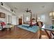 Bedroom features a canopy bed, wood floors, shutters, and stylish decor at 326 Caneflower Ct, North Las Vegas, NV 89031