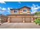 Charming two-story home with a three-car garage and well-maintained landscaping at 326 Caneflower Ct, North Las Vegas, NV 89031