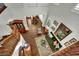 Birds-eye view of the foyer with hardwood floors, staircase, and multiple rooms at 326 Caneflower Ct, North Las Vegas, NV 89031