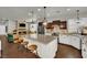 Spacious open concept kitchen with granite counters, stainless appliances, an island, and fireplace at 326 Caneflower Ct, North Las Vegas, NV 89031