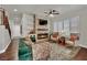 Living room has stone fireplace, hardwood floors and window with shutter coverings at 326 Caneflower Ct, North Las Vegas, NV 89031