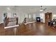 Upstairs hallway features hardwood floors and an open layout to the main living areas at 326 Caneflower Ct, North Las Vegas, NV 89031