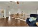Hallway with hardwood floors, chandelier, and an open layout to the living areas at 326 Caneflower Ct, North Las Vegas, NV 89031