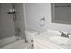Well-lit bathroom featuring a shower-tub combo, toilet, and vanity with a sink and mirror at 3260 N Heritage Way, Las Vegas, NV 89121
