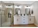 Bathroom features a double sink vanity with a glass-enclosed shower at 356 Gulfport Ct, Las Vegas, NV 89145