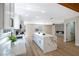 Bright open floorplan with a modern fireplace, spacious kitchen island, and wood-style flooring at 356 Gulfport Ct, Las Vegas, NV 89145