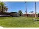 Lush green backyard featuring a basketball hoop, perfect for outdoor recreation and leisurely activities at 3708 Lorraine Ln, Las Vegas, NV 89120
