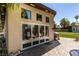 Beautiful backyard featuring a spacious patio, seamless indoor-outdoor living, and palm trees at 3708 Lorraine Ln, Las Vegas, NV 89120